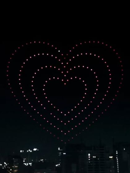 A heart formation glows in the night sky during the Piyush Mishra concert in Hyderabad. This simple yet powerful image was part of a sequence designed to evoke the emotion of his music.