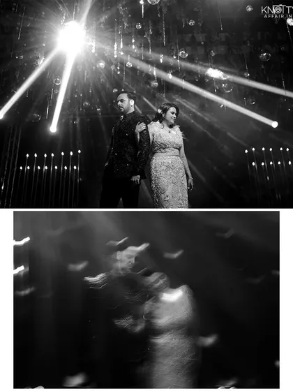 A creative black and white shot of the couple on stage, using lens flare and motion blur to create a dynamic and artistic effect.