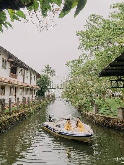 The couple makes a unique and picturesque entry, arriving at their Haldi ceremony on a speedboat through a narrow canal.