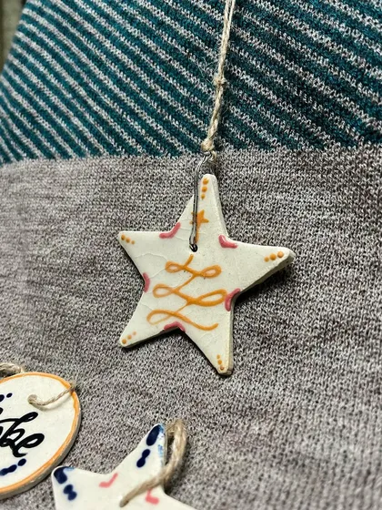 A close-up of one of the star ornaments from the 'Hope' set.