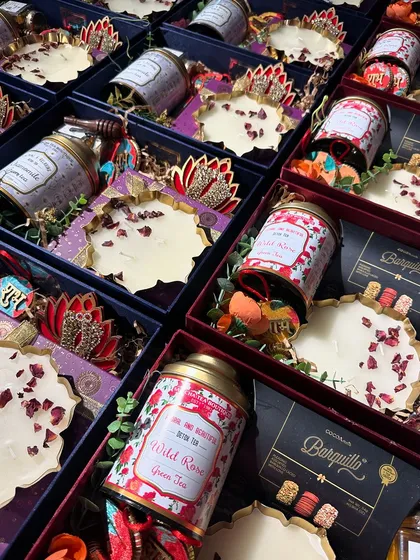An assortment of our premium Diwali hampers for Aum Papers and Label Affairs. You can see the different color schemes and product combinations we offer.