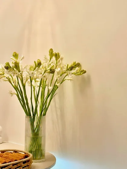Fresh flowers to welcome you. It's the little things that make the studio feel like a sanctuary.