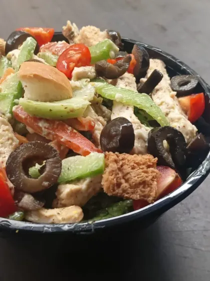 A side view of the same chicken salad, showing the generous portion size. These salads are designed to be a full meal that keeps you satisfied.