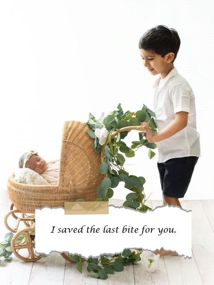A big brother proudly stands by his new baby sister in her wicker pram. This shot tells a story of protection and the beginning of a lifelong friendship.