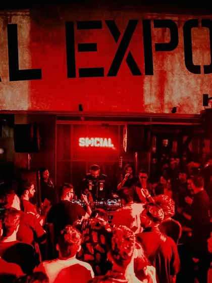 The view from the stage at Social Exposé, with the entire room bathed in red light. The energy was absolutely explosive.