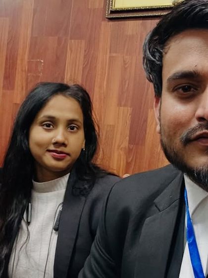 With colleagues during the election campaign at Karkardooma Court.