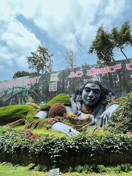 Another view of the stunning nature-themed sculpture at Siri Cafe, a popular photo spot on our Chikmagalur trip.
