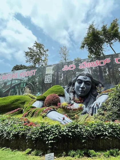 Another view of the stunning nature-themed sculpture at Siri Cafe, a popular photo spot on our Chikmagalur trip.