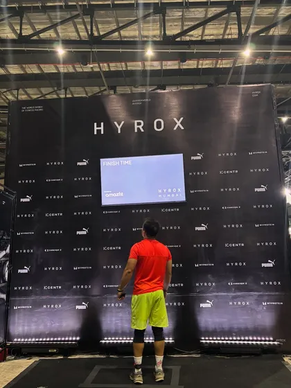 Staring down the finisher wall at Hyrox Mumbai. A moment of reflection after pushing my body to its limits. This is what we train for.