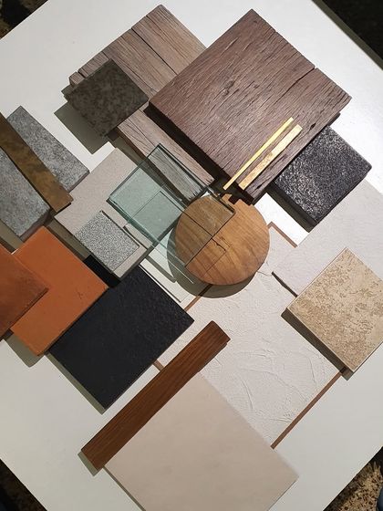 A flat lay of a material mood board for a retail project in Kalaghoda. This is a crucial step where clients can touch and feel the proposed textures, colors, and finishes, bridging the gap between renders and reality.