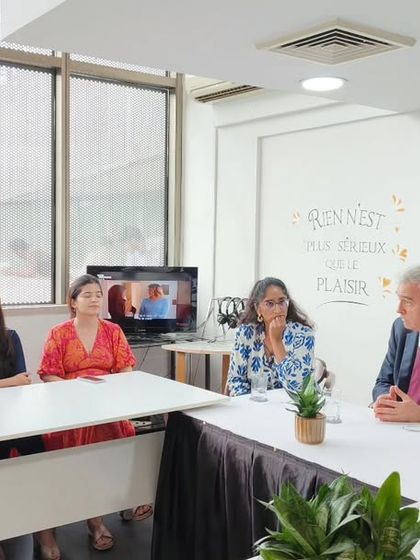 A candid shot of Dominique Antoine in conversation with our students. We foster an environment where students can freely interact with and learn from distinguished visitors.