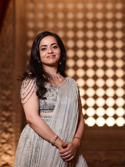 A gallery celebrating family bonds through fashion. These images feature more moments of mothers, sons, sisters, and other family members dressed in beautifully coordinated custom outfits for their most important events.