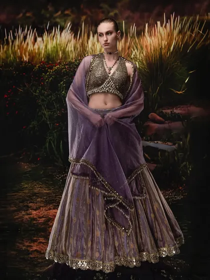 A cinematic fusion of a warm, projected landscape and a carefully lit model. This demonstrates how to balance the light on the subject with the background to create a cohesive, painterly fashion portrait.