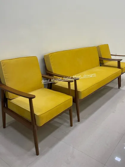 Different angle of the vibrant yellow mid-century modern sofa set.