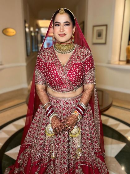 A full-length portrait of my bride in her stunning Ridhima Mehra lehenga. The makeup is classic and simple, perfectly balancing her intricate outfit.