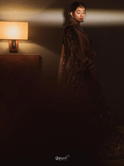 A bridal portrait is more than a photograph; it's a piece of art. Using light and shadow, we create moody, elegant portraits that capture the bride's essence and the quiet moments of reflection before she begins her new chapter.
