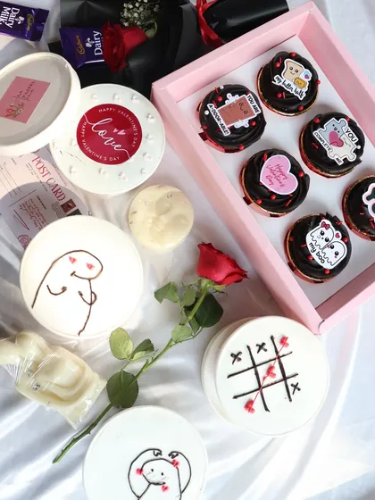 A glimpse of my entire Valentine's Day collection, featuring various dessert tubs, cupcakes, and candles.