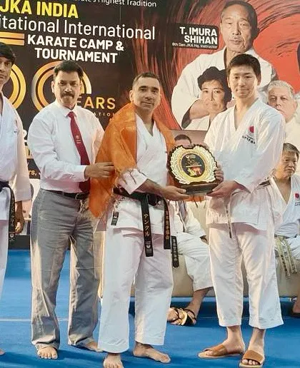 I am honored to be recognized by the senior leadership of the Japan Karate Association. Receiving this plaque at the 1st JKA India International Karate Camp is a testament to my commitment to upholding the traditions of JKA karate.