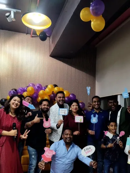 It's all about celebrating together! This is the energy I bring, getting everyone, from friends to family, involved with fun props and creating happy, candid moments.