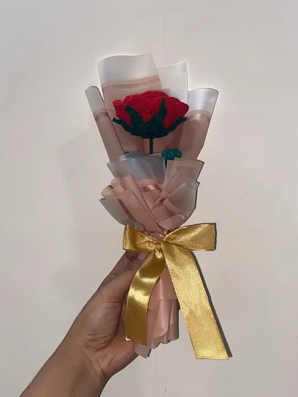 Holding the single red rose bouquet. It's a simple, classic, and affordable way to show someone you're thinking of them.