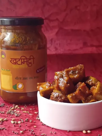 My sweet mango pickle is a perfect balance of 'khat-mitthi'. It's a delicious treat that goes well with puris, parathas, or even just by itself.