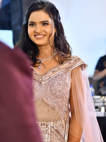 A candid moment of pure joy. Her makeup was designed to last through all the smiles, laughter, and happy tears of her engagement day.