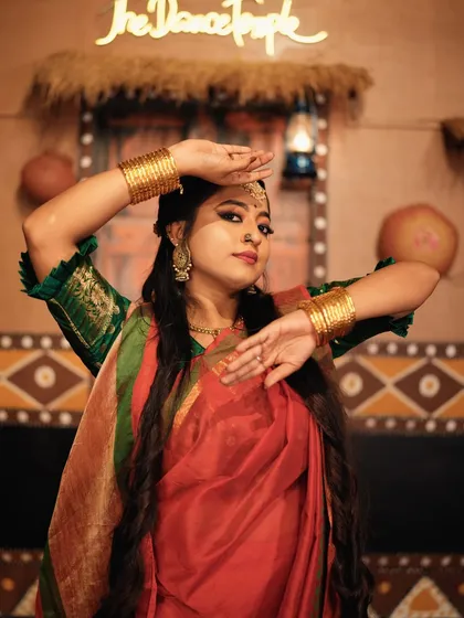 A classic semi-classical pose showing the hand mudras and expressions that are central to this dance form.