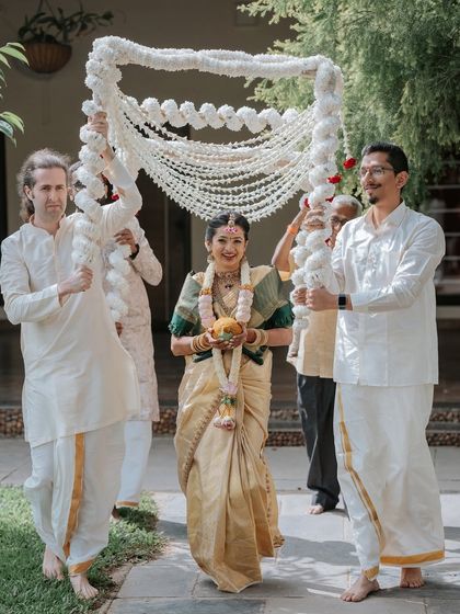 The bride's grand entrance, looking every bit the traditional, graceful bride.