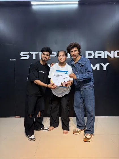 Shally with her certificate. We are proud of every student who completes this demanding course.