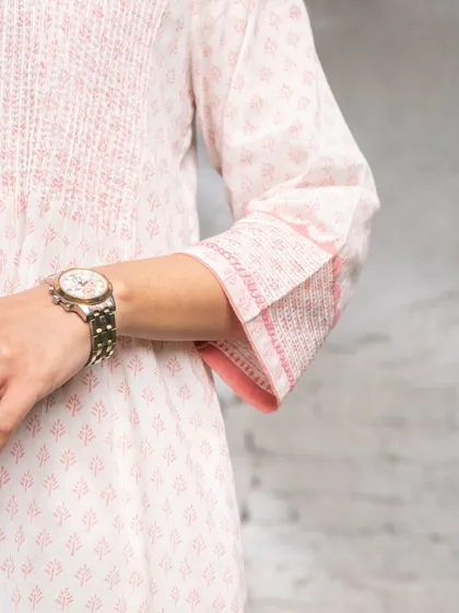 Another look at the sleeve details of our Suhani Appliqué edit. The careful tucks and contrast trims are not loud, but they bring the whole design together with a sense of quiet confidence.