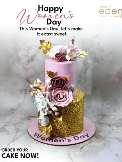 A cake to celebrate women. This two-tier cake, created for Women's Day, features a gold glitter tier and a pink tier decorated with beautiful sugar flowers.