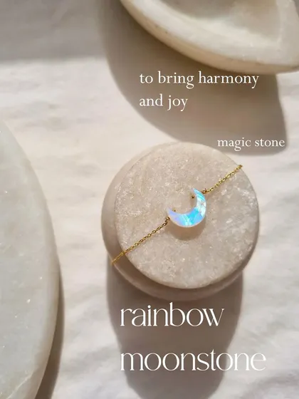 My rainbow moonstone bracelet, featuring a beautiful blue flash. This stone, a type of white labradorite, is perfect for enhancing creativity and bringing a sense of harmony and joy to your day.