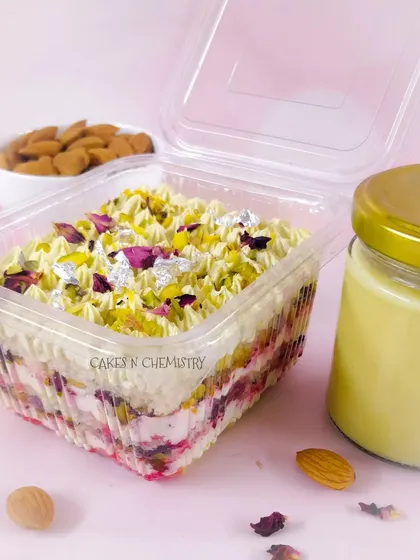 For Holi, I created this Thandai Tres Leches tub cake. It's a light, airy cake soaked in a three-milk mixture infused with traditional thandai spices and topped with pistachios and rose petals.