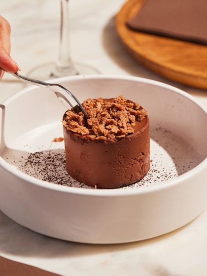 Another angle of our popular Bitter Chocolate Mousse, a perfect indulgence to conclude your dining experience at Comorin.