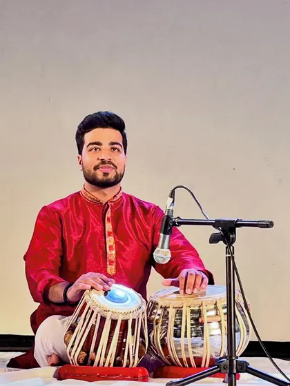 Another shot from my solo concert, with the light catching the syahi of the dayan.