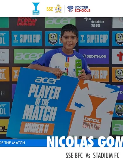 Nicolas Gomes holding his Player of the Match award at the U11 DPDL Super Cup.