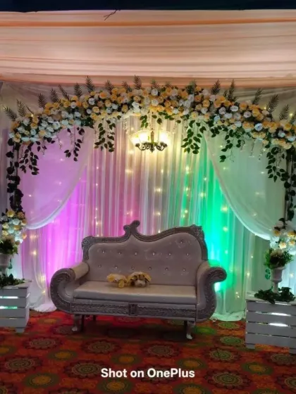 The same engagement stage viewed with different colored lighting. This shows how I can use lights to change the mood and vibe of the same decoration.