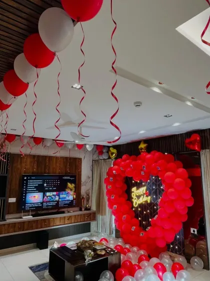 The full living room view of the heart-shaped balloon frame surprise, showing how it can transform a space.