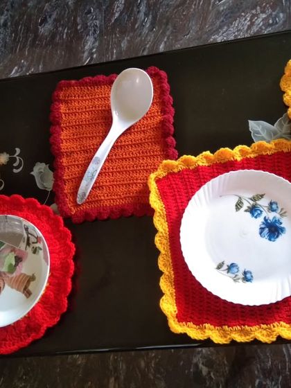Showing how my table mats can be used with plates and cups.