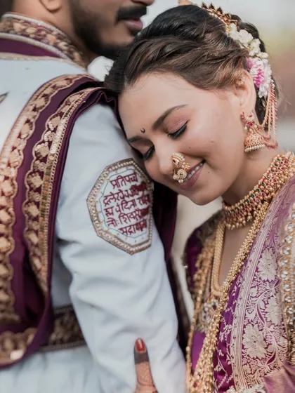 A quiet moment of love. This royal Peshwai bridal look, with intricate jewelry and a soft, romantic makeup palette, is designed to be timeless and unforgettable.