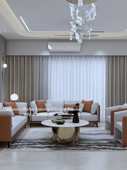 A full view of the Panvel living room, showing the complete seating arrangement and the stunning effect of the feature wall and modern chandelier.
