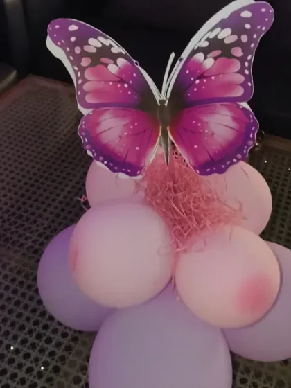 A simple yet beautiful butterfly-themed table centerpiece. I use these to extend the party's theme to the guest tables, creating a more immersive experience.