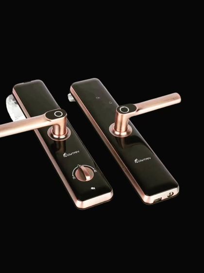 A product shot of our bronze and black smart door lock against a black background, highlighting its premium design for luxury homes and properties.