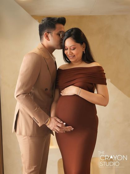 A whispered secret or a gentle kiss on the temple. This close, intimate pose captures the deep and private bond between the couple.