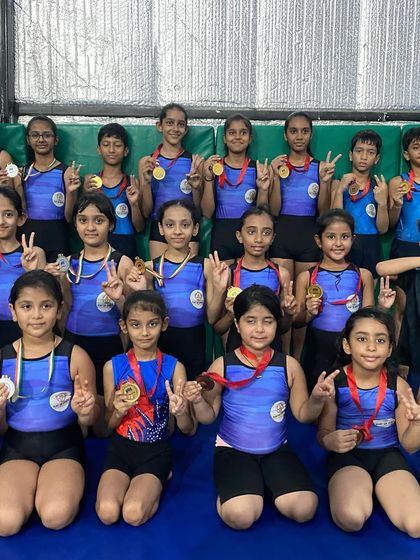 The happy faces of our champions, showing off their medals after a successful competition. This is the result of their hard work.