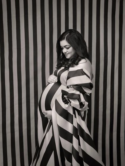 The same iconic striped look, rendered in a classic monochrome filter. This version feels even more timeless and artistic, focusing on the interplay of light, shadow, and pattern.