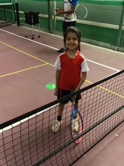 A future star in the making at our Off The Mark facility. We use smaller nets and courts to help our mini tennis players learn the game in a fun and accessible way.