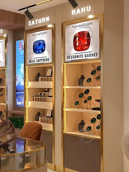 A detailed render of the gemstone display units. Each section is dedicated to a specific stone, like Blue Sapphire and Hessonite Garnet, creating an educational and visually appealing shopping experience.