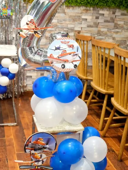 A close-up of the 'Planes' theme decor, showing the attention to detail with character cutouts.