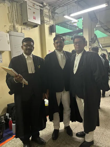 With the Deputy Solicitor General of India at the Calcutta High Court. Interacting with senior government counsel is an essential part of my practice in constitutional and administrative law.